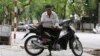 Một tài xế xe ôm 62 tuổi ở Hà Nội.