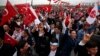 Supporters of Devlet Bahceli, the leader of the Nationalist Movement Party (MHP), chant slogans as he addresses a rally ahead of the Nov. 1 general elections, in Istanbul, Oct. 18, 2015.