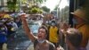 FILE - Anti-coup protesters shout slogans during a demonstration, May 6, 2021, in Yangon, Myanmar.