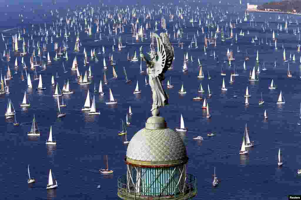 Sailing boats gather at the start of the Barcolana regatta in front of Trieste harbour, Italy, Oct, 9, 2016.