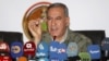FILE - Khalid al-Obeidi, now ousted as Iraq's defense minister, speaks during a news conference in Baghdad, Dec. 19 2015.