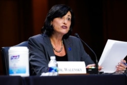 FILE - Dr. Rochelle Walensky, director of the Centers for Disease Control and Prevention, testifies on Capitol Hill in Washington, March 18, 2021. She expressed concern March 26, 2021, about rising case numbers across the U.S.