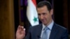 FILE - Syria's President Bashar al-Assad in Damascus, Feb. 9, 2015.