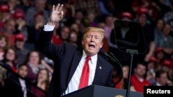 U.S. President Donald Trump speaks during a campaign rally in Grand Rapids, Mich., March 28, 2019.