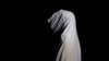 FILE - A woman, unnamed to protect her identity, who told Reuters she received an abortion under a secret program run by the Nigerian military, poses for a portrait in an undisclosed location in Nigeria, Sept. 28, 2020. Military leaders denied the abortion program ever existed.