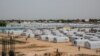 FILE - A tent city for people internally displaced by Boko Haram violence is seen at the unfinished Mohammed Goni Stadium in Maiduguri, Nigeria, July 26, 2019.