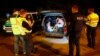 A group of migrants from Syria sits inside a vehicle stopped by German police on a country road heading to Freilassing, Germany, from Salzburg, Austria, Sept. 13, 2015.