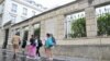 FILES - Pupils arrive at Victor-Duruy high school on the first day of new academic year in Paris, France, Sept. 4, 2023. 