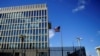 FILE - A security guard stands outside the U.S. Embassy in Havana, Cuba, Dec. 12, 2017.