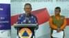 Juru Bicara Pemerintah untuk Penanganan Virus Corona, Achmad Yurianto dan Juru Bicara BNPB Agus Wibowo saat menggelar konferensi pers di Gedung BNPB Jakarta, Rabu, 18 Maret 2020. (Foto: VOA/Sasmito)