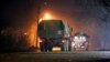 Truk militer bergerak menyusuri jalan di luar Donetsk, wilayah yang dikuasai oleh militan pro-Rusia, Ukraina timur, 22 Februari 2022. (AP)