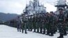 Foto yang dirilis oleh TNI (3/1/2019) menunjukkan Laksamana Madya Yudo Margono sedang memeriksa pasukan di Natuna. Indonesia memperketat pengawasan atas perairan Natuna. (Courtesy: Puspen TNI)