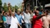 Protesters shout slogans as they take part in a rally called by various Hindu organizations after two women entered the Sabarimala temple in Kochi, India, Jan. 2, 2019.