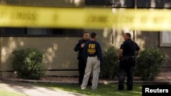 Jami'in FBI mai bincike yana yiwa 'yansanda tambayoyi