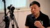 Wang Zhi'an berbicara dalam wawancara dengan the Associated Press di Tokyo, pada 5 Oktober 2022. (Foto: AP/Eugene Hoshiko)