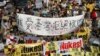 Protesters march during an anti-nuclear demonstration in Taipei, Taiwan on March 9, 2013. 