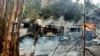 Foto yang dirilis oleh Pasukan Pertahanan Negara Bagian Karenni Myanmar (KNDF) menunjukkan kendaraan yang terbakar di wilayah Hpruso, negara bagian Kayah, Myanmar, pada 24 Desember 2021. (Foto: KNDF via AP)