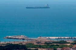 FILE - A picture taken from La Linea de la Concepcion in southern Spain shows supertanker Grace 1 suspected of carrying crude oil to Syria in violation of EU sanctions after it was detained in Gibraltar on July 4, 2019.
