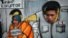 Para pendukung KPK berpawai dengan menggunakan kardus bergambar petugas KPK menangkap koruptor di Malang, Jawa Timur, 23 Januari 2015. (Foto: AFP)