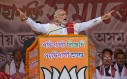 Indian Prime Minister Narendra Modi addresses a youth rally organized by the Bharatiya Janata party (BJP) ahead of Assam state elections in Gauhati, India, Jan. 19, 2016.