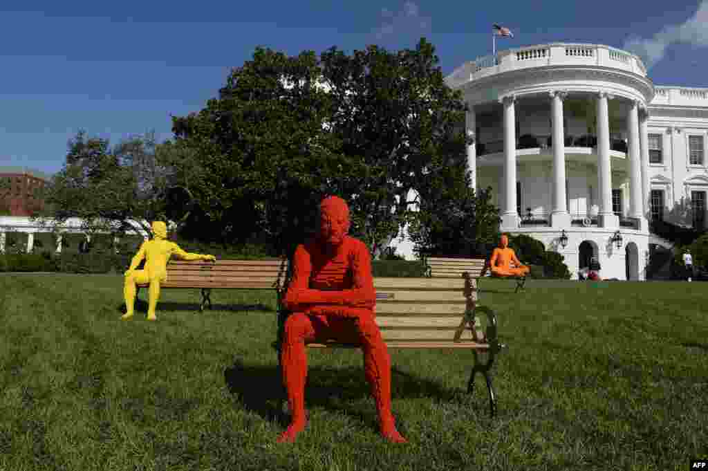 "The Park People Series" by artist Nathan Sawaya is seen on the South Lawn of the White House during the "South By South Lawn", SXSL festival in Washington, D.C.