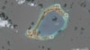 A satellite image shows what the Asia Maritime Transparency Initiative says appear to be anti-aircraft guns and what are likely to be close-in weapons systems (CIWS) on the artificial island Subi Reef in the South China Sea in this image released on Dec. 13, 2016.
