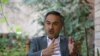 In this Aug 18, 2015, photo, Mohammad Daoud Sultanzoy, a former lawmaker overseeing the handover of military airports for the Afghan government, speaks during an interview with the Associated Press in Kabul.