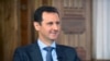 Syria's President Bashar al-Assad answers questions during an interview with al-Manar's journalist Amro Nassef, in Damascus, Syria, in this photograph handed out by Syria's national news agency SANA on Aug. 25, 2015. 