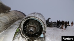 The wreckage of an airplane is seen after a crash in Deh Yak district of Ghazni province, Afghanistan January 27, 2020. NO RESALES. NO ARCHIVES.
