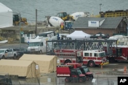 Kendaraan darurat dan operasi pemulihan terlihat di dekat muara Sungai Anacostia di Sungai Potomac dekat Bandara Nasional Ronald Reagan Washington, 31 Januari 2025.