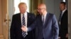U.S. President Donald Trump speaks with Belgian Prime Minister Charles Michel prior to a meeting at the Royal Palace in Brussels, May 24, 2017. 