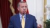 FILE - Turkey's President Recep Tayyip Erdogan speaks at a joint media briefing with Indonesia's President Joko Widodo at the presidential palace in Jakarta, Indonesia, July 31, 2015.