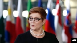 FILE - Australian Foreign Minister Marise Payne arrives for the ASEM 12 in Brussels, Oct. 18, 2018. 