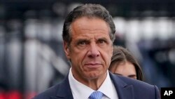 FILE - Former New York Governor Andrew Cuomo prepares to board a helicopter after announcing his resignation in New York, Aug. 10, 2021. On Saturday, he announced he is running for mayor of New York.