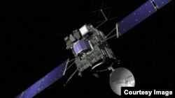 FILE - Artist view of the Rosetta spacecraft. Rosetta’s lander, Philae, is attached and is shown in blue (© ESA/J. Huart)