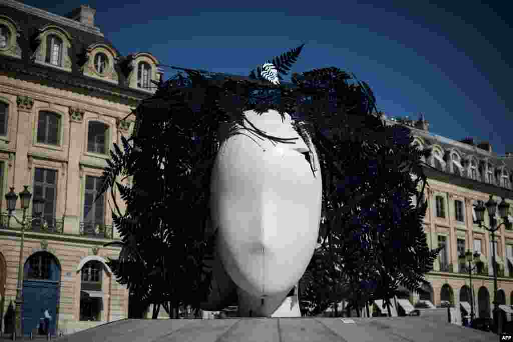 A sculpture by Spanish artist Manolo Valdes is seen at Place Vendome in Paris, France.