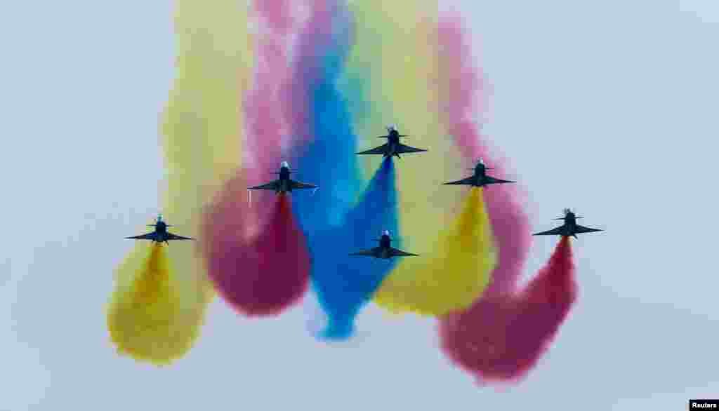 China's J-10 fighter jets perform during an air show, the 11th China International Aviation and Aerospace Exhibition in Zhuhai, Guangdong Province.