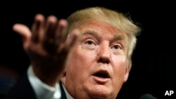 Kandidat calon presiden dari Partai Republik Donald Trump berbicara di hadapan para pendukungnya di Des Moines, Iowa, bulan lalu.
