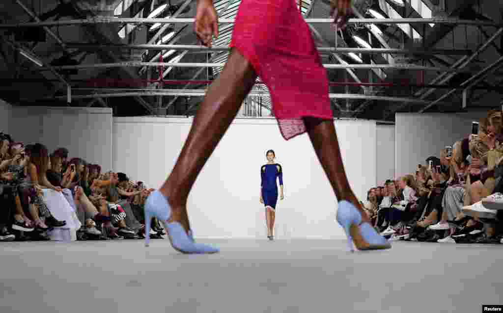 A model presents a creation at the Emilio De la Morena catwalk show during London Fashion Week.