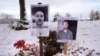 FILE - Fotografija dve žrtve iz Luistona u Mejnu, za čije je ubistvo odgovoran Robert Kard (AP Photo/Robert F. Bukaty, File)
