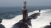 弗吉尼亚级攻击潜艇“南达科他”号（USS South Dakota) 在大西洋海上试验期间浮出水面。