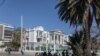 Journalists gather outside the Supreme Court of Haiti (Cours de cassation)on February 8, 2021 in the almost empty streets of Port-au-Prince.