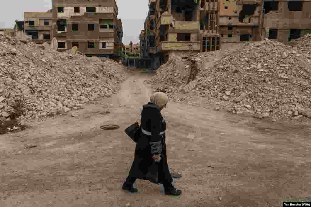 Former residents of the Yarmuk Palestinian refugee camp are returning to their destroyed homes because the cost of living in and around Damascus has become too expensive in recent years.