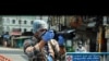 Agence France Presse photographer Diptendu Dutta works in India on April 10, 2020, during a government-imposed nationwide lockdown to prevent the spread of the COVID-19 coronavirus.