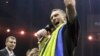 Олександр Усик святкує перемогу над Муратом Гассієвим