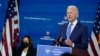 President-elect Joe Biden speaks as Vice President-elect Kamala Harris listens at left, during an event to introduce their nominees and appointees to economic policy posts at The Queen theater, Dec. 1, 2020, in Wilmington, Del. 