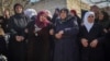 Syria president calls for unity after reports of mass killings
