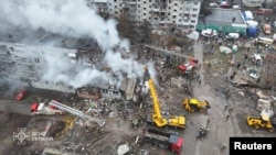 A drone view shows the site of an apartment building hit by a Russian missile strike in Poltava, Ukraine, Feb. 1, 2025. (State Emergency Service of Ukraine via Reuters)