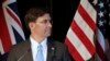 FILE - U.S. Secretary of Defense Mark Esper briefs the media following annual bilateral talks with Australian counterparts in Sydney, Australia, Aug. 4, 2019. 